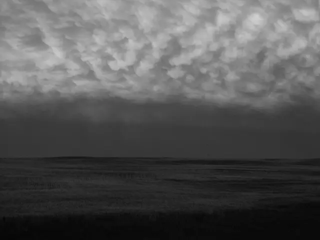 Storm clouds over prairie fields near Chamberlain