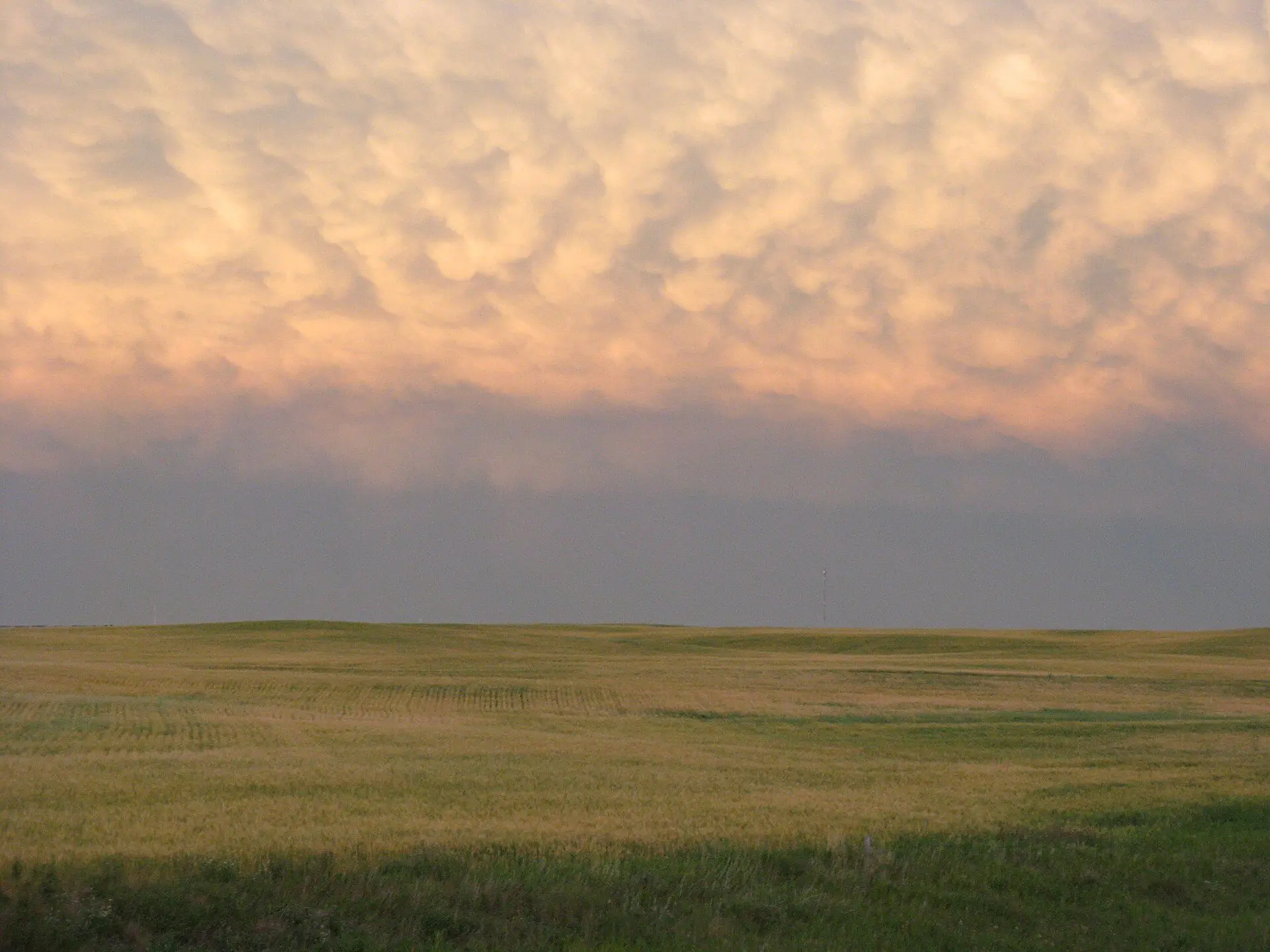 Prairie fields under mammatus clouds near Chamberlain